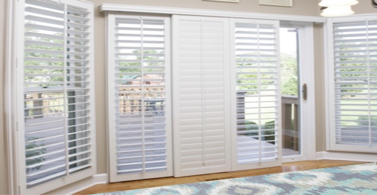 [Polywood|Plantation|Interior ]211] shutters on a sliding glass door in Fort Lauderdale